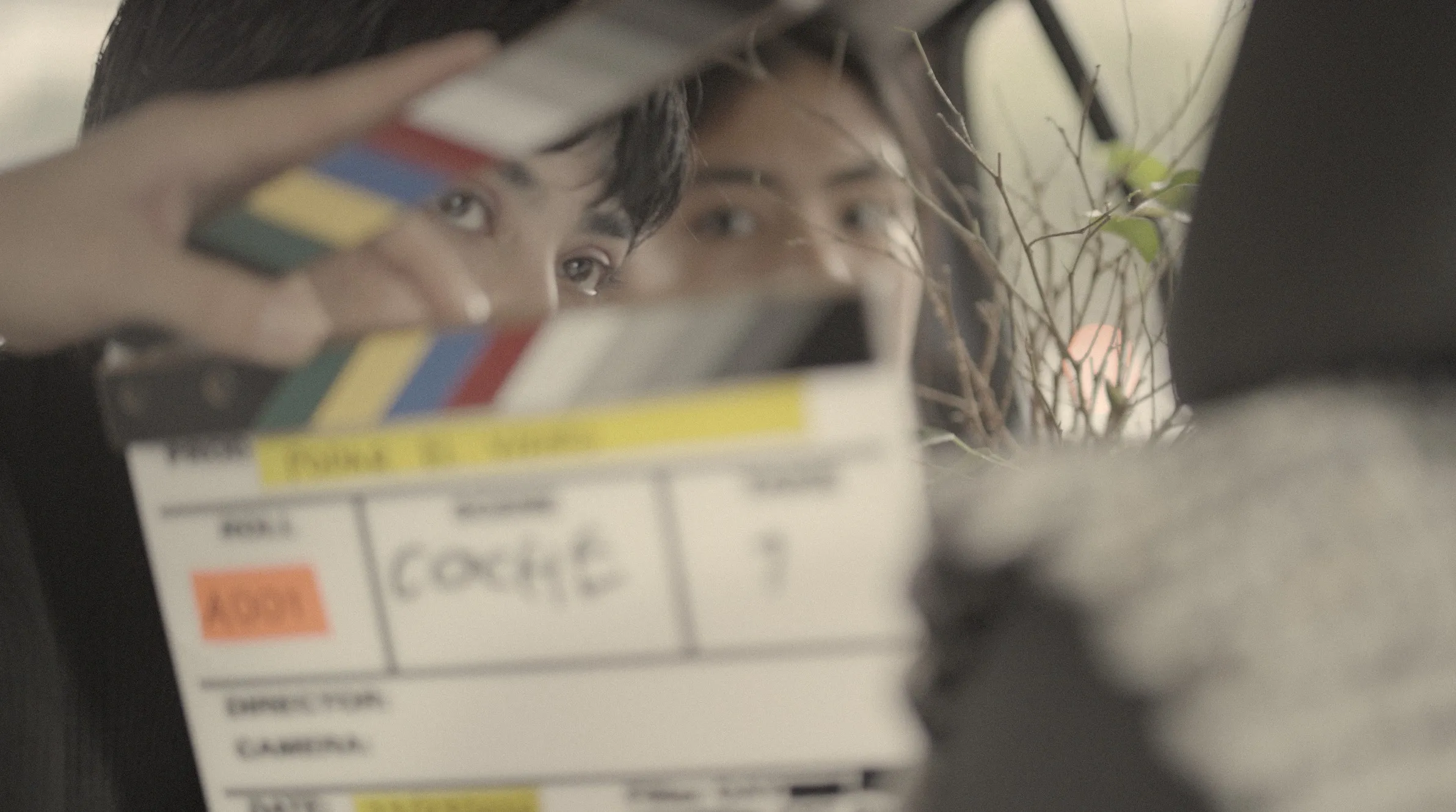 Hellen H. Castro looks through the clapperboard on the set of the Podar el viento teaser